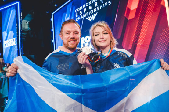 James Hood from Esports Scotland celebrating medals at the Commonwealth Esports Championships