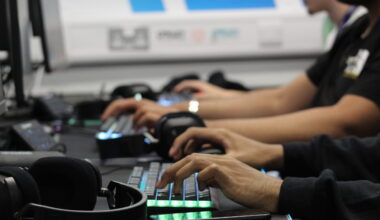 College of Esports Image of Students Utilising PC Equipment