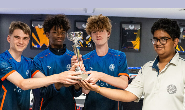 Ibstock Place School student esports team lifting trophy 2